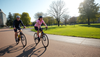 People who cycling outdoors to lose weight